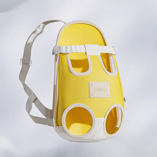 Yellow portable cat backpack carrier with mesh ventilation windows and adjustable chest straps