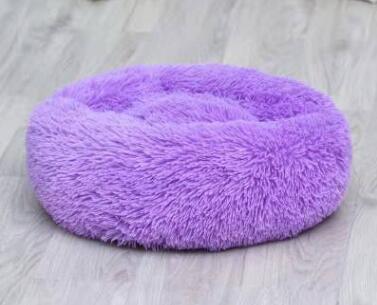 A cozy Purple Cat Bed 