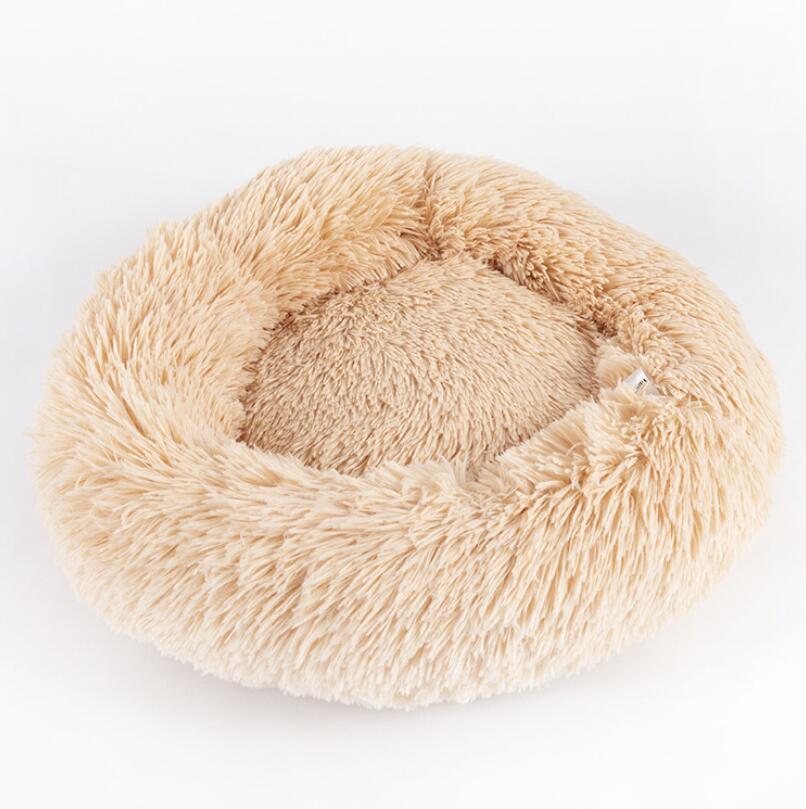 A cozy round Beige Coloured Cat Bed 