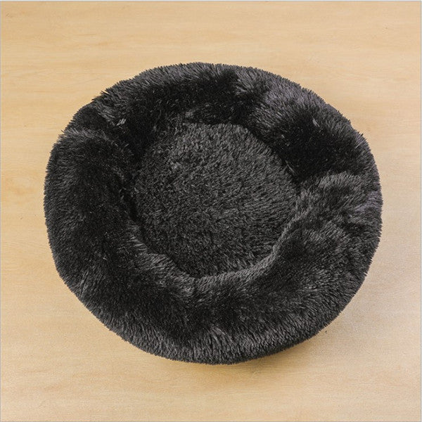 A cozy round black Cat Bed 