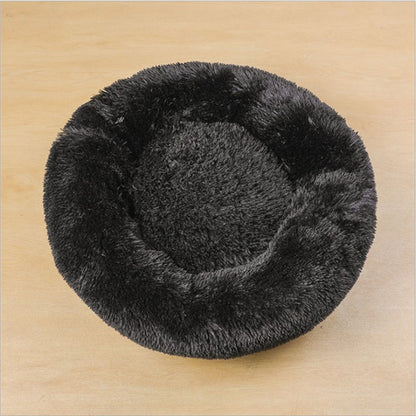 A cozy round black Cat Bed 