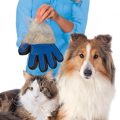 A person holds a Cat Grooming Glove, showing collected fur, with a curious cat in the background. 