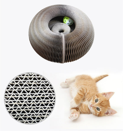 Cat Scratching board showing a kitten and a ball playing 