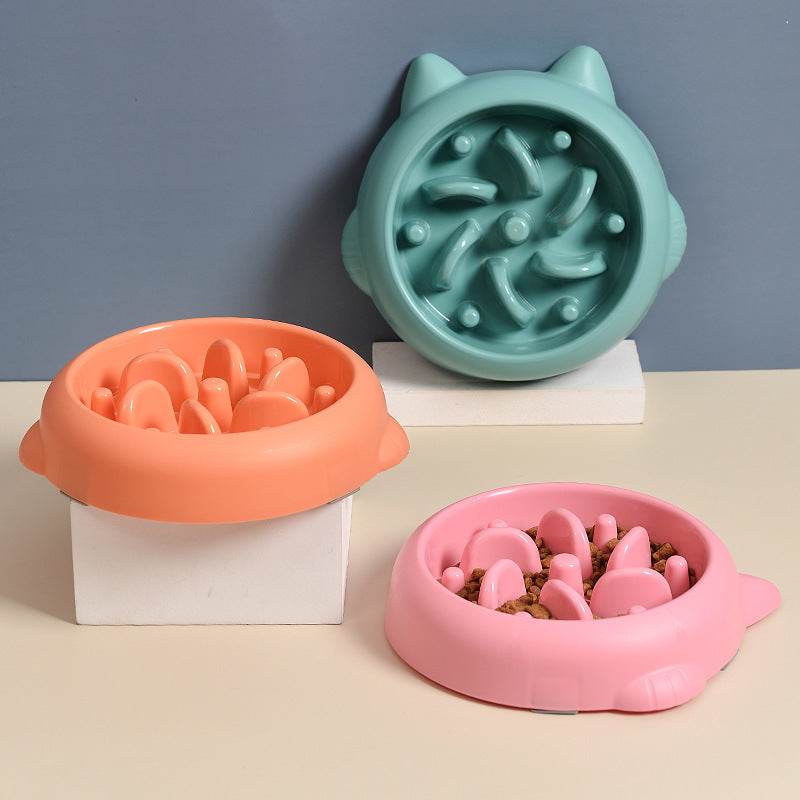 Cat Slow Feeder Set showing green bowl, pink bowl and orange bowl. 