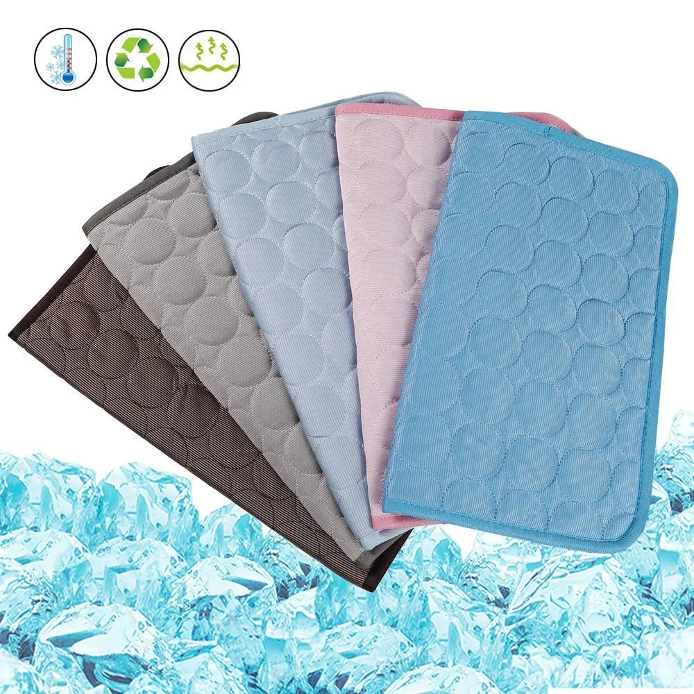 A collection of different coloured Cooling Dog Mats 