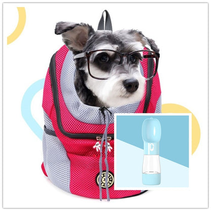 Red Dog Backpack with a dog inside feeling comfortable with a blue water bottle 