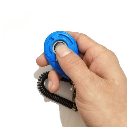 Dog Clicker in blue being used 