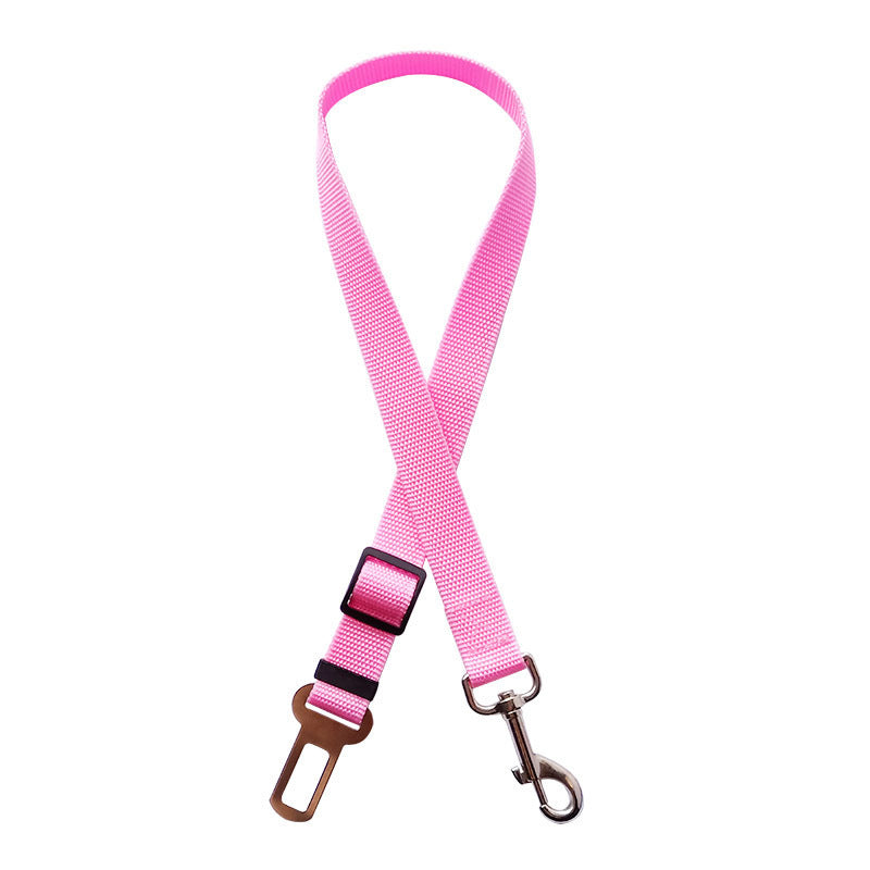 a pink seatbet strap for dogs 