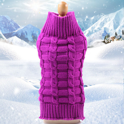 Cozy Purple Dog Sweater against a snowy mountain backdrop. 