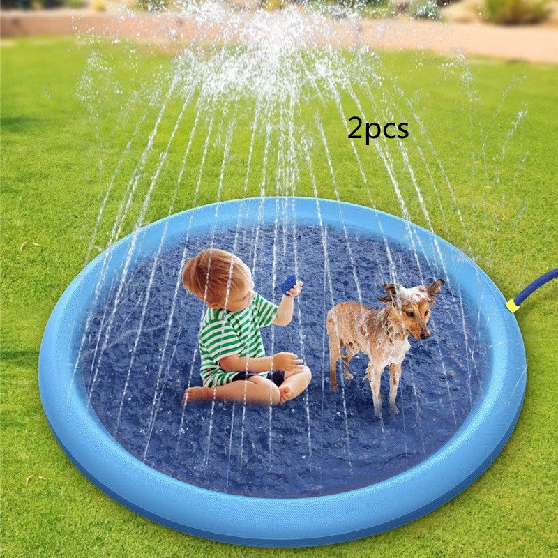 Splah Pad For Dogs, young boy plying in the water with a dog 