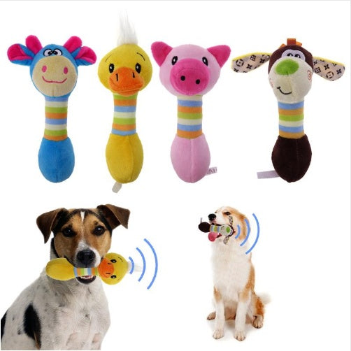 A dog joyfully playing with colorful squeaky chew toys shaped like animals.